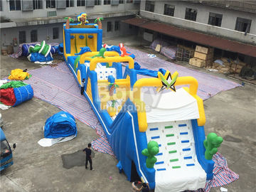 Cheerful blue and yellow giant Inflatable Obstacle Course Rental with basketball shooting