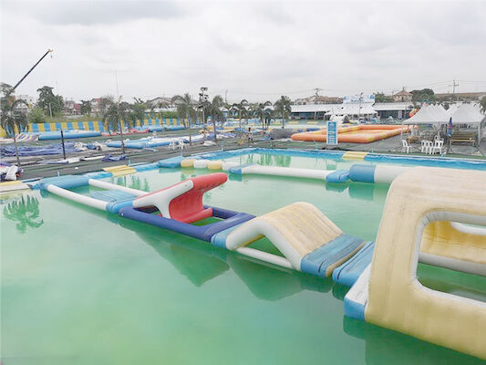 Anti - UV 0.9mm PVC Tarpaulin Inflatable Water Obstacle Course For Lake